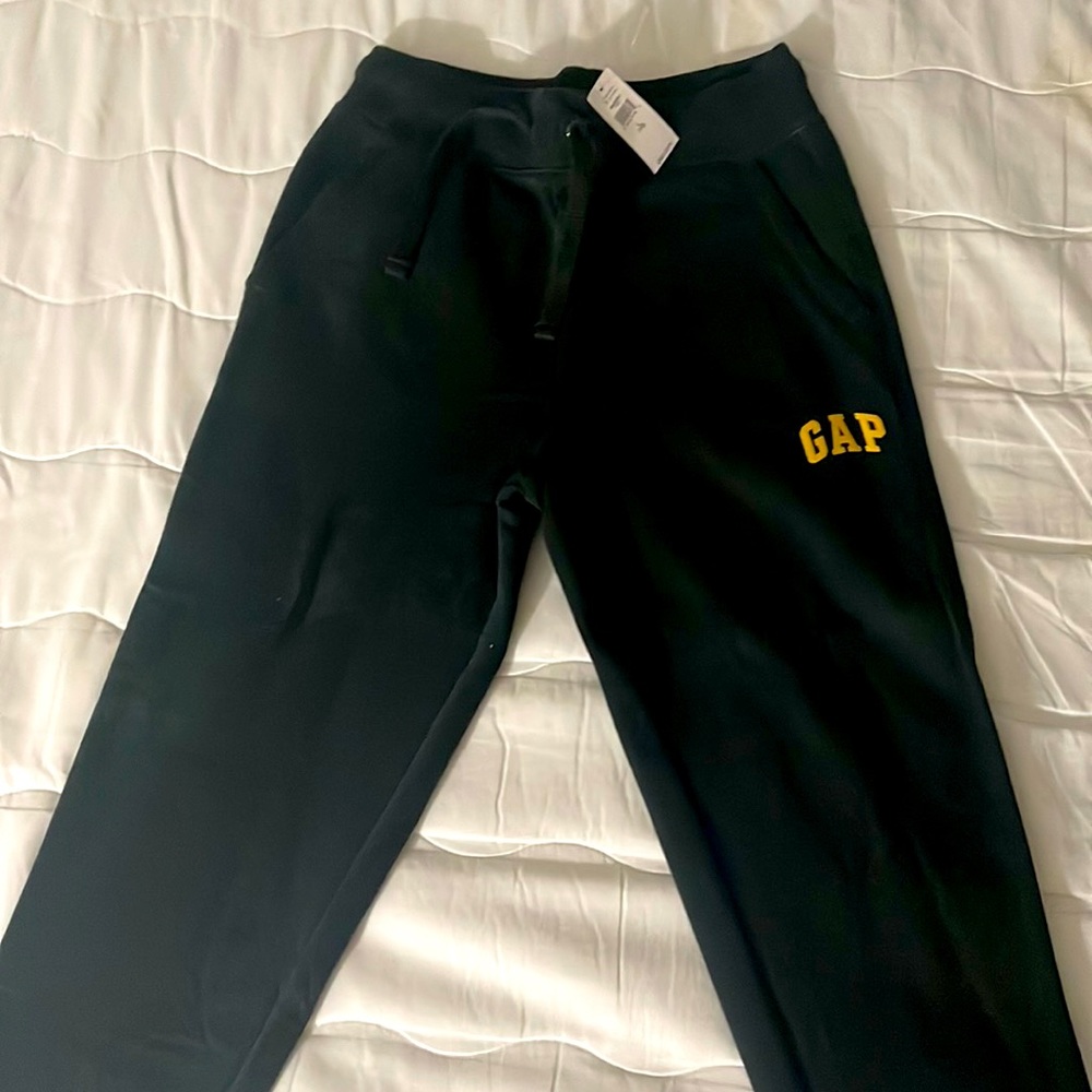 Never before worn, size: L (10), black jogging pants.